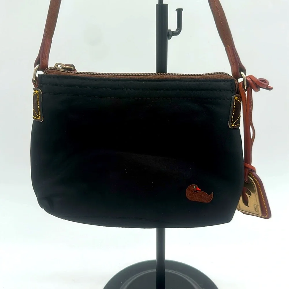 Dooney & Bourke Blue Nylon Crossbody Pouchette. Leather Strap & DB Tag